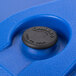 A navy blue plastic Cambro Camtainer lid with a black round button.