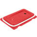 A red plastic Camtainer lid with white trim and a vent.