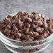 A bowl of Ghirardelli semi-sweet chocolate chips.