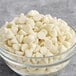 A bowl of Regal Classic white chocolate chips.