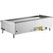 A Vulcan countertop gas griddle with stainless steel rectangular metal top.