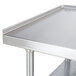 An Advance Tabco stainless steel equipment stand with a shelf.
