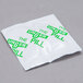 A white packet with green writing that says "Unger The Pill Glass Cleaner Concentrate Tablet"