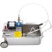 A white Vulcan fryer oil filter machine with a hose.