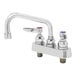 A T&S chrome deck-mounted faucet with two handles and a 6" swing nozzle.