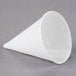 A close-up of a Genpak white cone shaped paper cone cup.