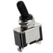 A black and silver Noble Products toggle switch.