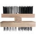 A wooden block with metal bristles for a Carlisle double head broiler and grill cleaning brush.