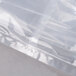 A close-up of a clear plastic bag with a seam.