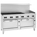 A large stainless steel Vulcan commercial gas range with 8 burners, a 24-inch griddle, and two ovens.