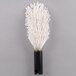 A white fluffy brush with a black cap and black handle.