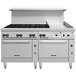 A white Vulcan commercial range with black knobs and a griddle.