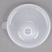 A white plastic lid with perforated openings.