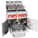 A Vulcan gas floor fryer system with two open fryer units and baskets.