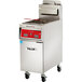 A large stainless steel Vulcan gas floor fryer with a red and white panel.