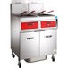 A Vulcan natural gas floor fryer system with red handles.
