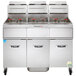 A Vulcan natural gas floor fryer system with solid state analog controls.