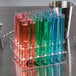 A group of Choice Crystal Clear test tubes with different colored liquids in them.