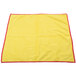A yellow Unger SmartColor microfiber cleaning cloth with red trim.