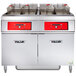 A Vulcan electric floor fryer system with red rectangular KleenScreen filters.