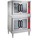 A large stainless steel Vulcan double convection oven with red handles on the doors.