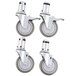 A set of four Vulcan casters with rubber wheels.