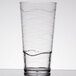 A clear GET plastic tumbler with wavy lines.