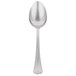 A silver spoon with an egg shaped handle.