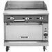 A stainless steel Vulcan V Series gas range with griddle and oven on wheels.