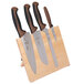 A set of Mercer Culinary Millennia® knives on a Mercer Culinary wooden magnetic board.