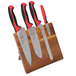 A Mercer Culinary Millennia Colors 5-piece knife set with red handles on a wooden block.
