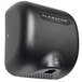 A black Excel XLERATOR hand dryer with a graphite textured cover.