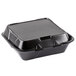 A black foam container with a hinged lid.