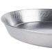 A close-up of a silver Royal Industries tapered aluminum deep dish pizza pan.