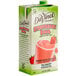 A carton of DaVinci Gourmet Strawberry Bomb Real Fruit Smoothie Mix with a straw in it.