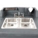 A Cambro Granite Gray CamKiosk portable self-contained hand sink with a stainless steel sink and two faucets.
