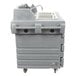 A gray Cambro CamKiosk portable sink cart with a gray sink and white shelf.