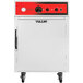 A white rectangular object with red and black text reading "Vulcan VRH8 Half Height Cook and Hold Oven"