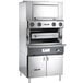 A large stainless steel Vulcan upright ceramic broiler with a door.