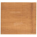 An American Metalcraft carbonized bamboo serving board with a wood surface.
