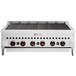 A Wolf stainless steel gas charbroiler with four burners.