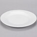 A 10 Strawberry Street Classic White porcelain lunch plate with a rim on a gray surface.