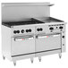 A large stainless steel Wolf commercial range with 6 burners, a griddle, and 2 ovens.