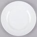A white 10 Strawberry Street porcelain salad/dessert plate with a white rim.