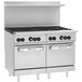 A large stainless steel Wolf commercial gas range with 8 burners and 2 ovens.
