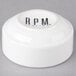 A white porcelain ramekin with black text that reads "RPM" in black.