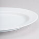 A 10 Strawberry Street Classic White oval porcelain platter with a white rim.