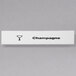 A white rectangular Cambro ID clip with black text reading "champagne" on it.