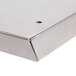 A stainless steel Wolf reinforced high shelf with a hole in the middle.
