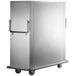 A large silver Metro heated banquet cabinet on wheels.